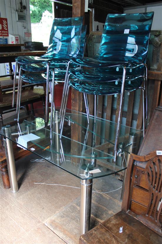 Modern chrome dining table, shaped rectangular tinted glass top & six blue teal perspex and chrome chairs